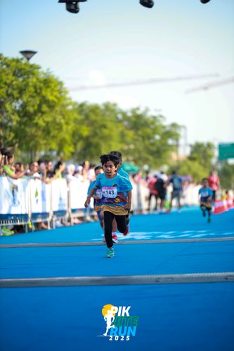 Race photo from PIK NITE RUN 2025