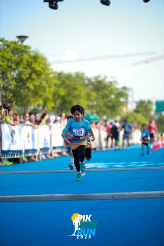 Race photo from PIK NITE RUN 2025