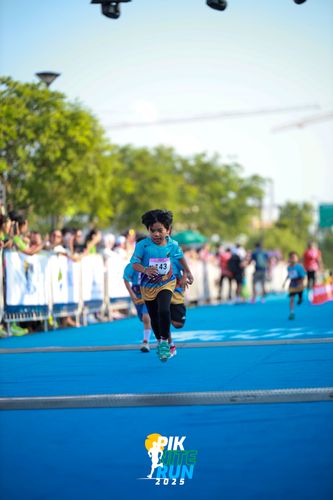 Race photo from PIK NITE RUN 2025