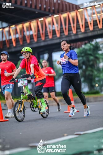 Race photo from Smartfren Run 2025 