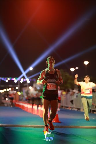 Race photo from PIK NITE RUN 2025