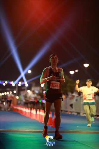 Race photo from PIK NITE RUN 2025