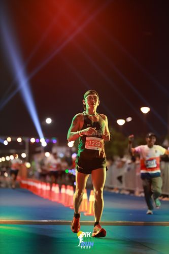 Race photo from PIK NITE RUN 2025