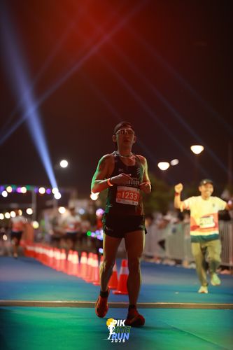 Race photo from PIK NITE RUN 2025
