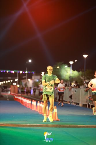 Race photo from PIK NITE RUN 2025