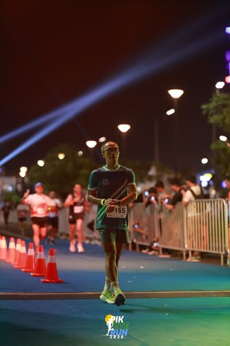 Race photo from PIK NITE RUN 2025