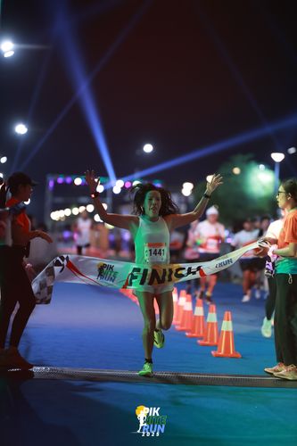 Race photo from PIK NITE RUN 2025