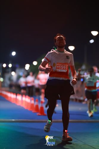Race photo from PIK NITE RUN 2025