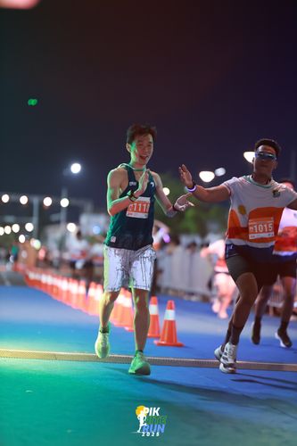 Race photo from PIK NITE RUN 2025