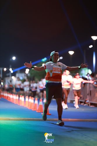 Race photo from PIK NITE RUN 2025
