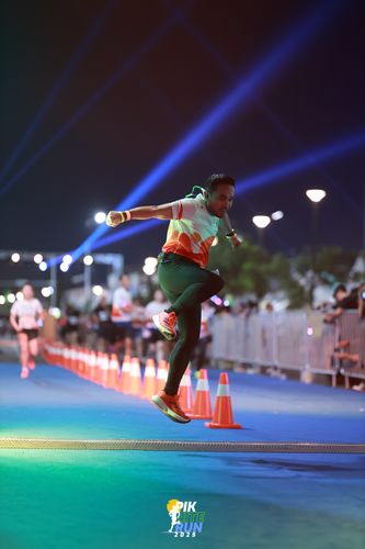 Race photo from PIK NITE RUN 2025