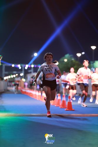 Race photo from PIK NITE RUN 2025