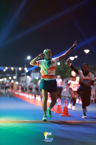 Race photo from PIK NITE RUN 2025