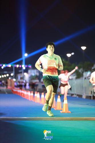 Race photo from PIK NITE RUN 2025
