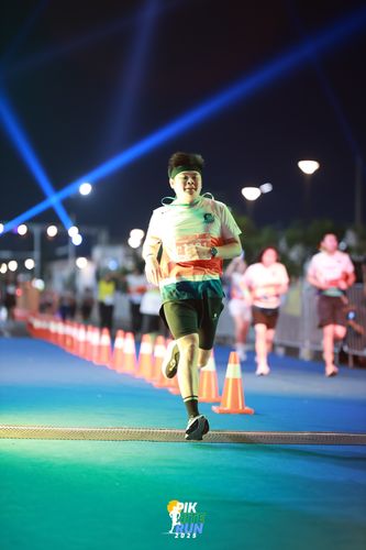 Race photo from PIK NITE RUN 2025