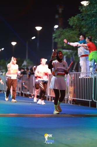 Race photo from PIK NITE RUN 2025