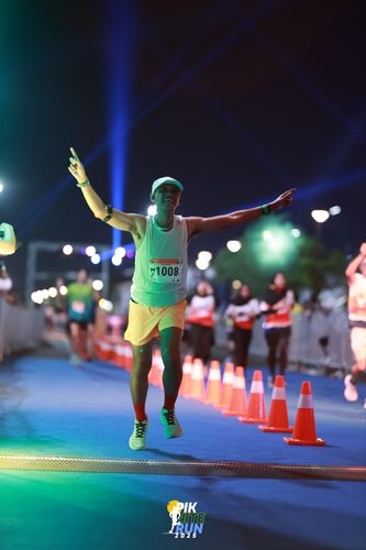 Race photo from PIK NITE RUN 2025
