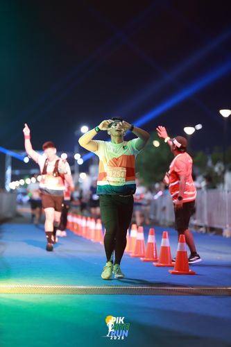 Race photo from PIK NITE RUN 2025