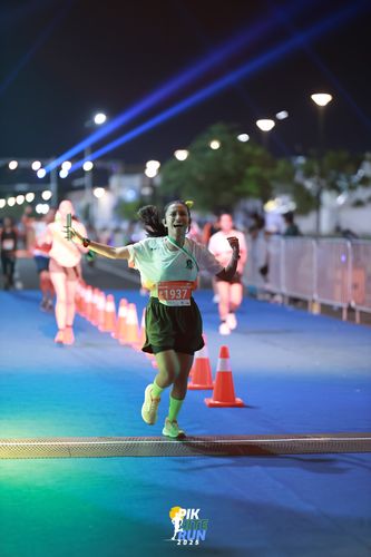 Race photo from PIK NITE RUN 2025