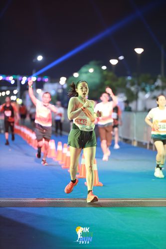 Race photo from PIK NITE RUN 2025