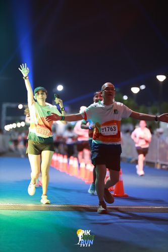 Race photo from PIK NITE RUN 2025