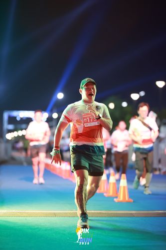 Race photo from PIK NITE RUN 2025