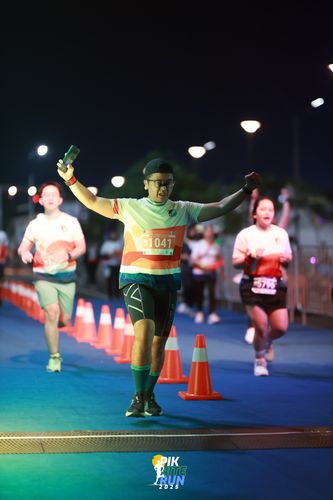 Race photo from PIK NITE RUN 2025