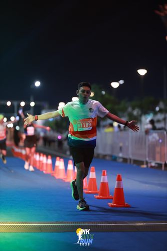 Race photo from PIK NITE RUN 2025