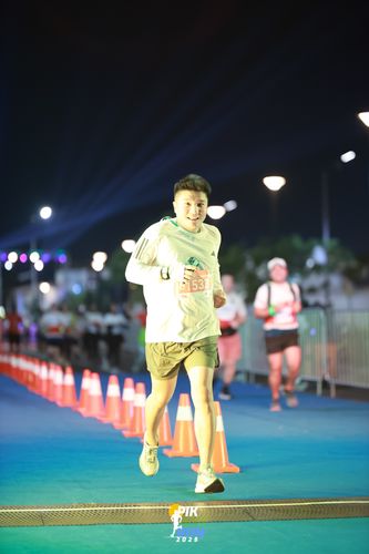 Race photo from PIK NITE RUN 2025