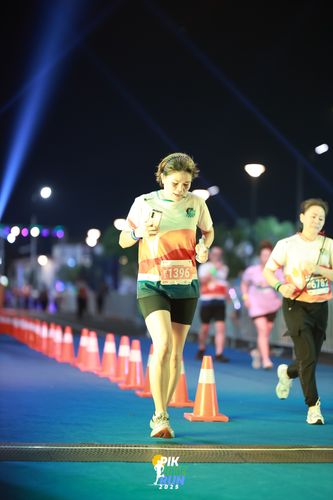 Race photo from PIK NITE RUN 2025