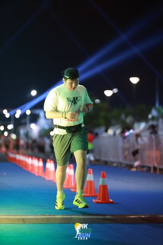 Race photo from PIK NITE RUN 2025