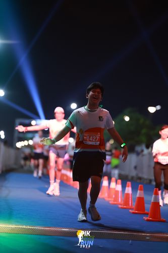 Race photo from PIK NITE RUN 2025