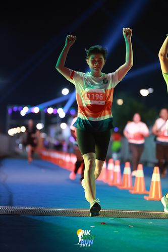 Race photo from PIK NITE RUN 2025