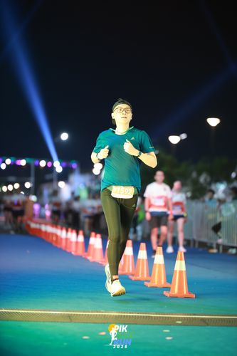Race photo from PIK NITE RUN 2025