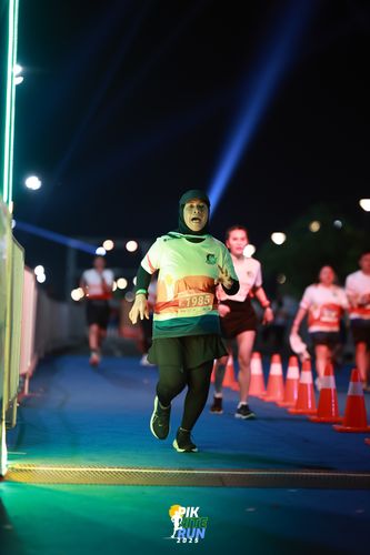 Race photo from PIK NITE RUN 2025