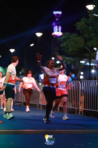 Race photo from PIK NITE RUN 2025