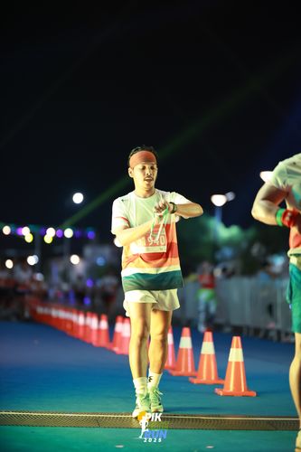 Race photo from PIK NITE RUN 2025