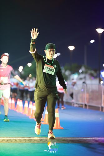 Race photo from PIK NITE RUN 2025