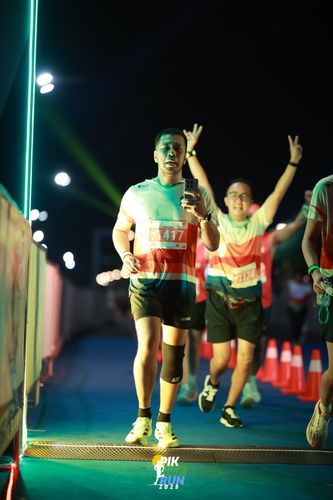 Race photo from PIK NITE RUN 2025