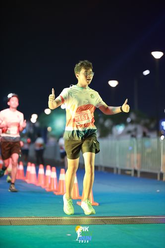Race photo from PIK NITE RUN 2025