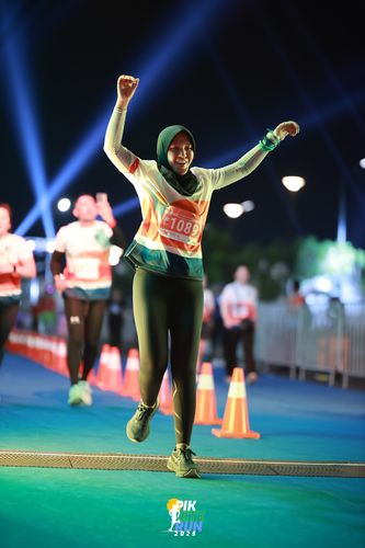 Race photo from PIK NITE RUN 2025