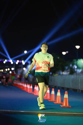 Race photo from PIK NITE RUN 2025