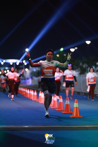 Race photo from PIK NITE RUN 2025