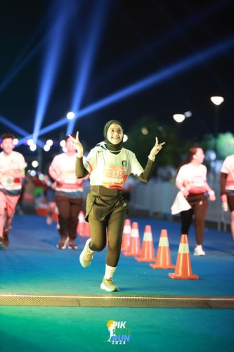 Race photo from PIK NITE RUN 2025
