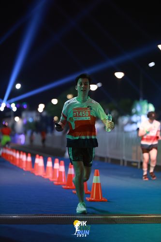 Race photo from PIK NITE RUN 2025
