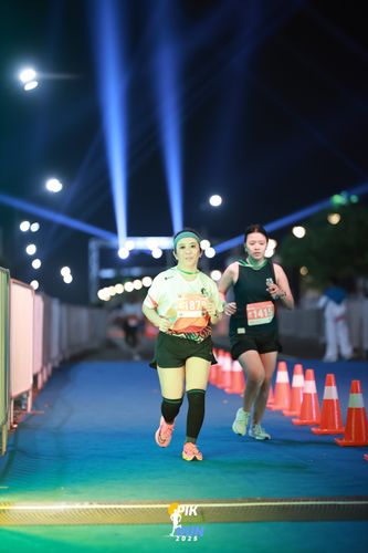 Race photo from PIK NITE RUN 2025