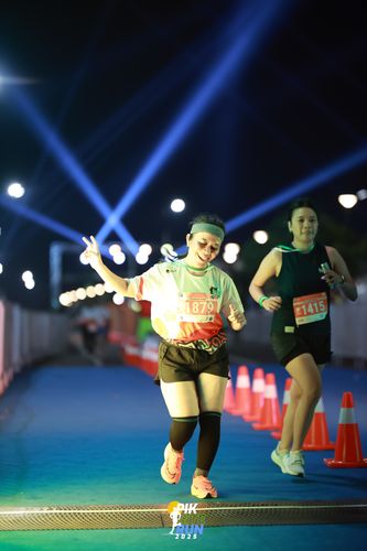 Race photo from PIK NITE RUN 2025