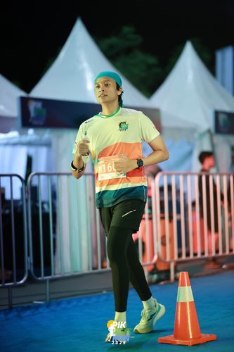 Race photo from PIK NITE RUN 2025