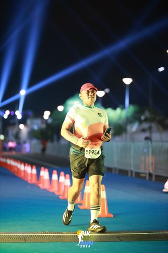 Race photo from PIK NITE RUN 2025