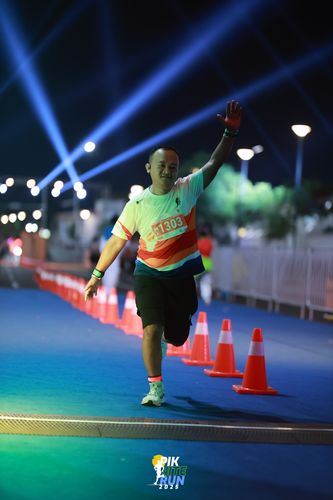 Race photo from PIK NITE RUN 2025